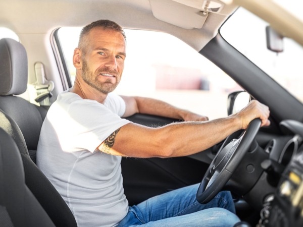 Man Driving a Car