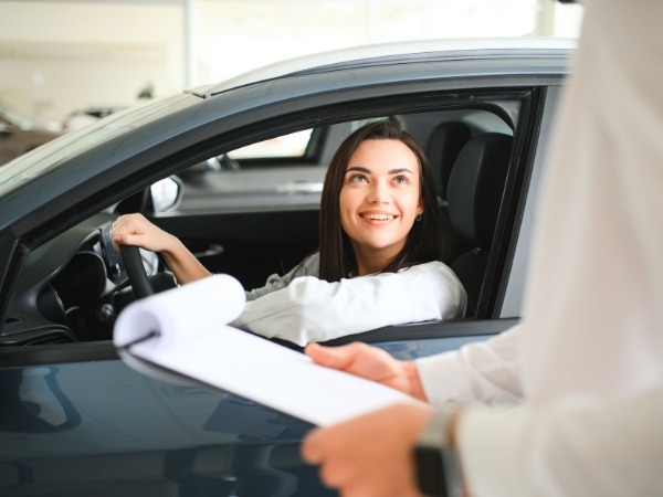 Woman Renting a Car