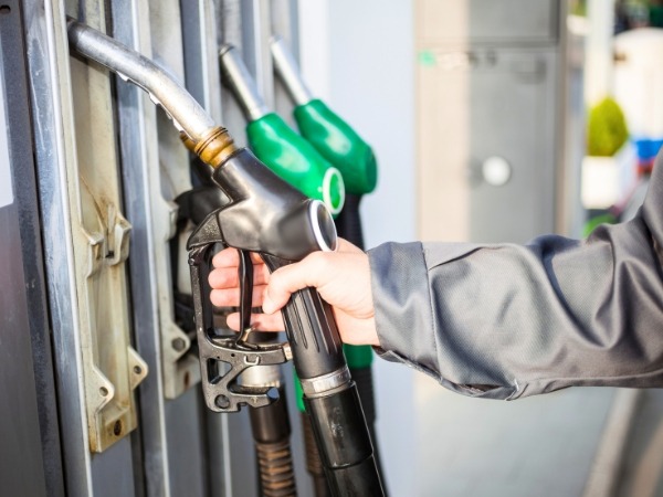 Man Holding a Fuel Pump
